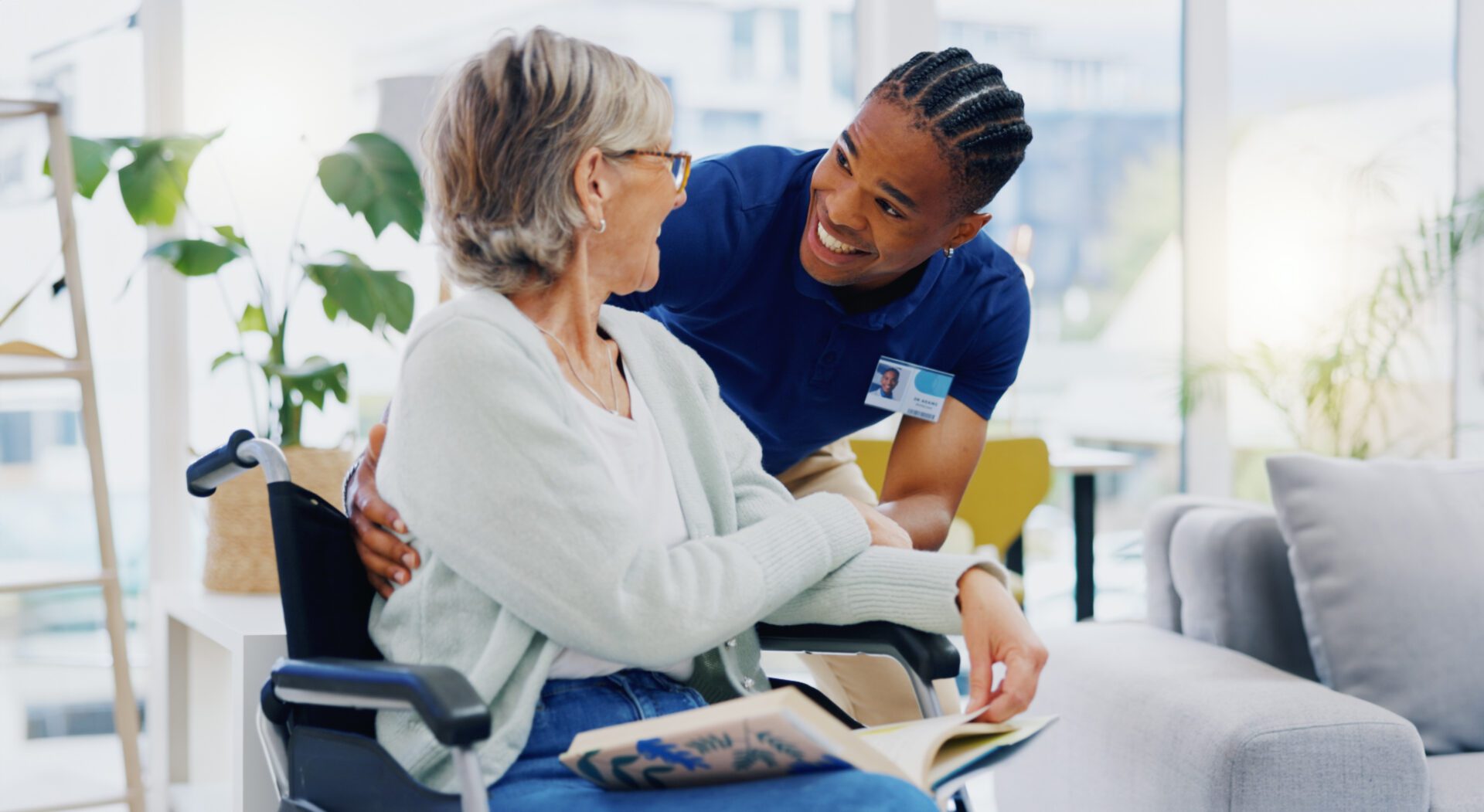 Caregiver talking with a senior about Medicare.